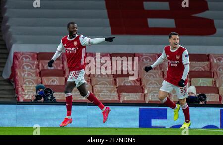 Londra, Regno Unito. 9 Apr 2021. Nicolas Pepe (L) dell'Arsenal festeggia l'8 aprile 2021 durante la prima partita di calcio della UEFA Europa League tra l'Arsenal FC e SK Slavia Praha all'Emirates Stadium di Londra, in Gran Bretagna. Credit: Xinhua/Alamy Live News Foto Stock