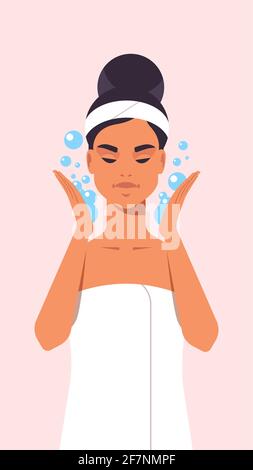 giovane donna che si lava faccia bella ragazza con pelle pulita e fresca vestito in asciugamano spa relax trattamento viso concetto ritratto Illustrazione Vettoriale