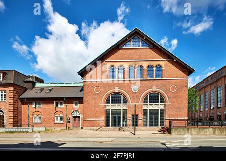 un edificio in mattoni rossi con finestre rotonde in danimarca Foto Stock