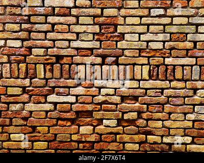 Parte orizzontale di un vecchio muro di mattoni rossi veneziani, sfondo, Foto Stock