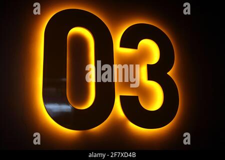 Numero zero e tre su un muro Foto Stock