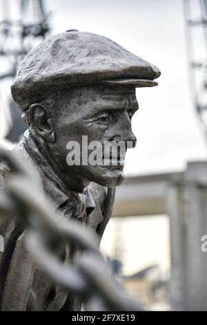 Statua del Docker fuori dal centro Excel, Londra Foto Stock