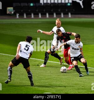 VALENCIA, SPAGNA - APRILE 11: Gabriel Paulista di Valencia CF, Kevin Gameiro di Valencia CF, Portu di Real Sociedad, Jose Luis Gaya di Valencia CF durin Foto Stock