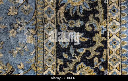 Tessuti Indiani per tappeti, ornamento astratto. Modello di mandala rotondo, tessuto di moquette tradizionale mediorientale. Foto Stock