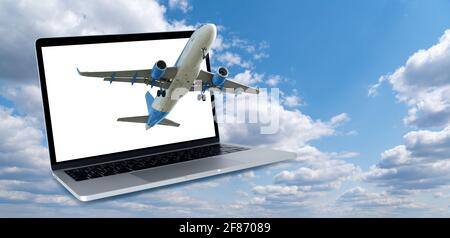 Aereo sullo sfondo di un computer portatile con uno schermo bianco. Modello di prenotazione di biglietti online Foto Stock
