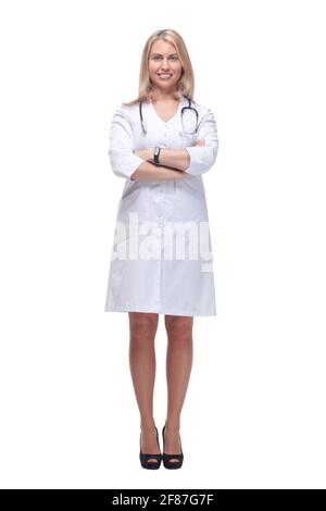 sorridendo giovane medico in un cappotto bianco che ti guarda. Foto Stock