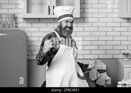 Ritratto di un cuoco felice. Cuoci cappello. Cuoco, cuochi o panettiere con bearded Foto Stock