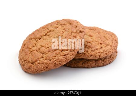 Un mazzo di biscotti freschi di farinata d'avena isolati su bianco. Foto Stock