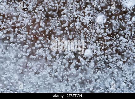 Bolle intrappolate nel ghiaccio. Foto Stock