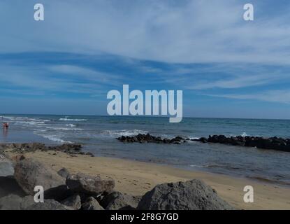 Spiaggia di Gran Canaria a Meloneras, spiaggia vicino al faro. Foto Stock