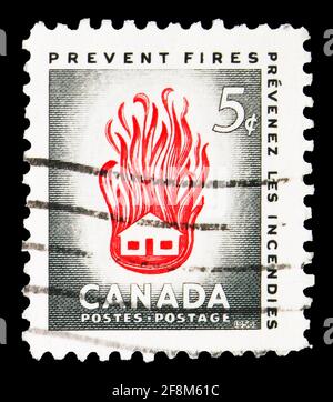 MOSCA, RUSSIA - 30 SETTEMBRE 2019: Francobollo stampato in Canada mostra House on Fire, Fire Prevention Week serie, circa 1956 Foto Stock