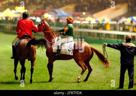 GARE INTERNAZIONALI DI JOCKEYS CHAMPIONSHIP A HAPPY VALLEY HONG KONG 11/12/2002 FOTO DAVID ASHDOWNRACING Foto Stock