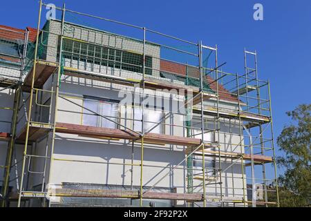 Nuova costruzione con intonaco di base finito Foto Stock