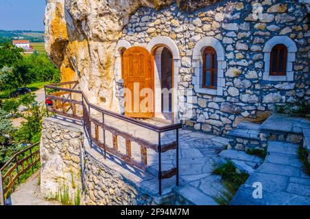 Monastero di roccia di Basarbovo vicino a Rousse, Bulgaria Foto Stock