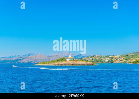 Far d'Alcanada nella baia di Alcudia, Maiorca, Spagna Foto Stock