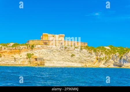 La torre di San Luciano vicino a Marsaxlokk a Malta Foto Stock