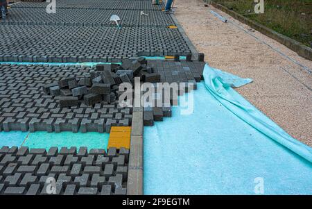 Cataste di pietre ad incastro per installazione passo carraio landscaping Foto Stock