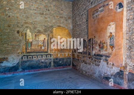 La Sala Grande con pareti dipinte in Casa dei Cupidi d'Oro, Pompei, Campania, Italia Foto Stock