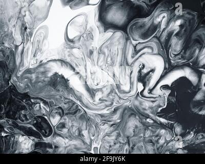 Bianco e nero creativo astratto dipinto a mano sfondo, marmo texture, pennello, acrilico pittura su tela. Arte moderna Arte contemporanea Foto Stock