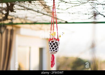 macrame pentola fatto a mano primo piano Foto Stock