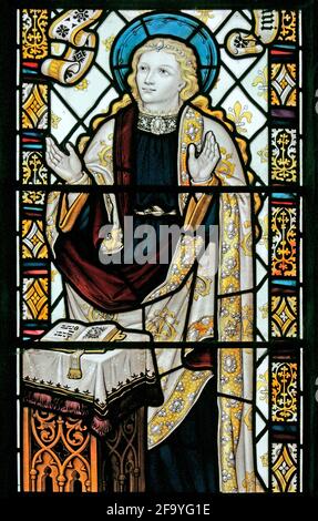 Una vetrata raffigurante la Vergine Maria all'Annunciazione, di Herbert Bryans, St Mary's Church, Leake, North Yorkshire Foto Stock