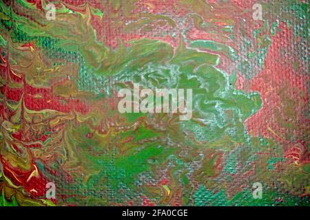 Quadro in tela marmorizzata con vernice acrilica nei colori rosso, verde e giallo Foto Stock