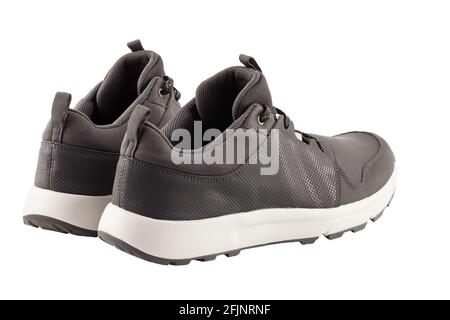 coppia di scarpe leggere airmesh estive walking nere isolate su sfondo bianco, vista posteriore Foto Stock