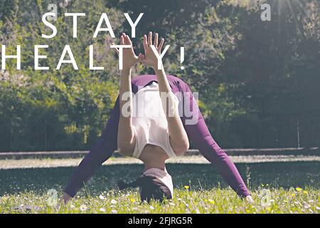 Donna in posizione di supporto con il testo 'Say Healthy' Foto Stock