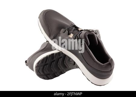 coppia di scarpe leggere airmesh estive walking nere isolate su sfondo bianco. Foto Stock