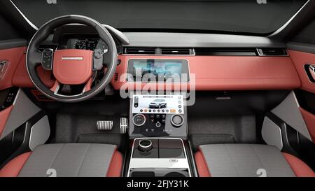 range rover velar con interni e sfondo nero Foto Stock