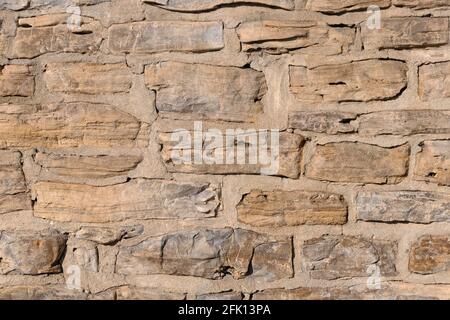 Muro di pietre naturali Foto Stock