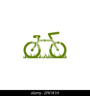 Bicicletta verde con icona erba. Logo Flat bike isolato su bianco. Illustrazione vettoriale. Simbolo trasporto ecologico. Un viaggio sano. Ecologia. Diventa verde. Mondo Illustrazione Vettoriale