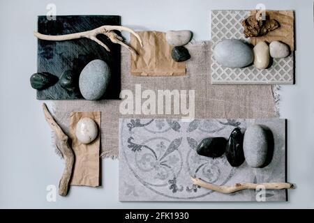 Layout creativo geometria astratta piazze per natura materiali carta, tessuto, ceramica con pietre e rami asciutti. Disposizione piatta. Spazio per qualsiasi prodotto. Foto Stock