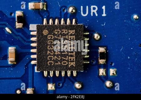 macro e closeup di foto su microchip, processori, scheda madre, all'interno di un dispositivo elettronico, un computer, un notebook Foto Stock