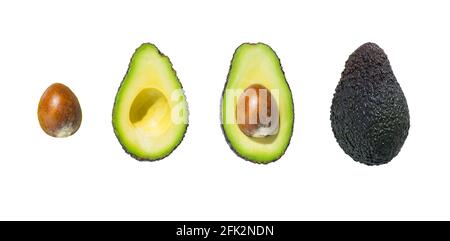 Vista dall'alto di frutta fresca matura intera e metà avocado isolato su sfondo bianco Foto Stock