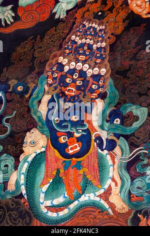 Antico dipinto buddista su una parete interna del monastero di Drepung vicino a Lhasa nella regione autonoma del Tibet in Cina. Uno dei "tre grandi" GE Foto Stock