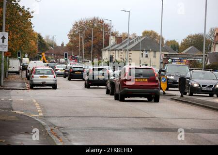 Ayr Whitletts traffico stradale congestion8.45 il traffico è costretto a. in una corsia per passare le auto fisse Foto Stock