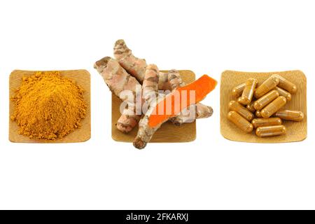 Rizoma curmerico, polvere e capsule isolate su bianco Foto Stock