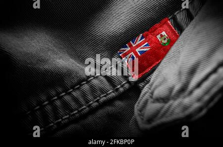 Etichetta su abbigliamento scuro sotto forma di bandiera delle Bermuda Foto Stock
