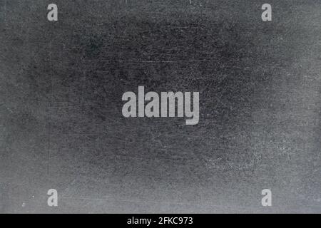 Grunge di colore bianco gesso texture nera su sfondo della scheda Foto Stock