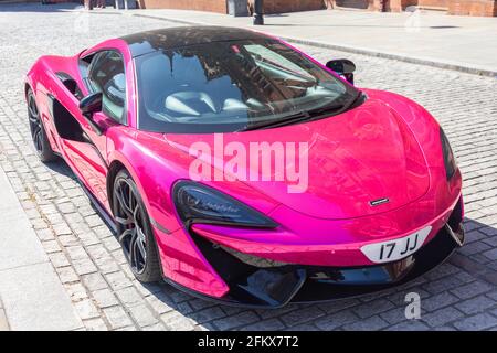 Pink McLaren 570S Supercar parcheggiata in Euston Road, King's Cross, London Borough of Camden, Greater London, England, Regno Unito Foto Stock