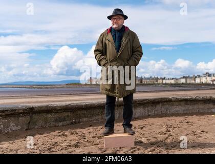 Troon, Scozia, Regno Unito. 4 maggio 2021. Fondatore di pro Union All for Unity partito George Galloway campagne sul lungomare di Troon in Ayrshire. Foto Stock