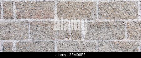 Muro di pietra sullo sfondo Foto Stock