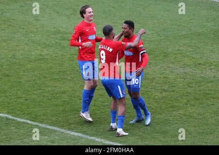 Angelo Balanta (10) di Dagenham e Redbridge segna il terzo gol per la sua squadra e celebra durante Dagenham & Redbridge vs Woking, Vanarama Nation Foto Stock