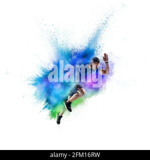 Uno sportivo caucasico in esplosione di polvere di neon colorato isolato su sfondo bianco Foto Stock