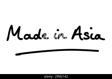 Prodotto in Asia, scritto a mano su sfondo bianco. Foto Stock