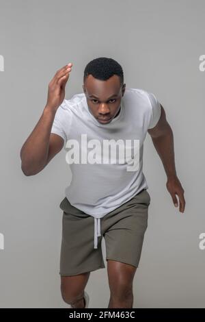 Serio afroamericano in running sportswear Foto Stock