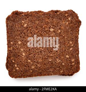 Due fette di pane sanitario tedesco con semi di girasole isolati su bianco. Vista dall'alto. Foto Stock