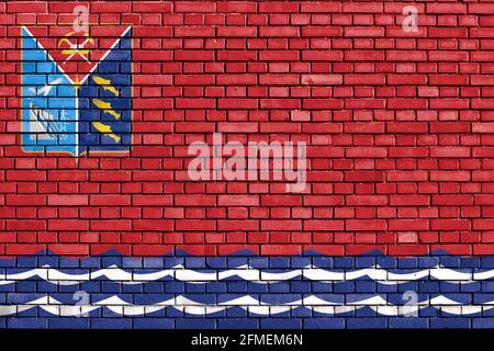 Bandiera di Oblast Magadan dipinto su muro di mattoni Foto Stock