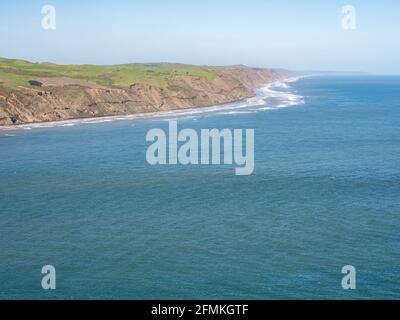 Capo sud del porto di Manukau ingresso dalla spiaggia di Whatipu Foto Stock